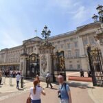 Outside Buckingham Palace, where King Charles hiring a royal phone operator.