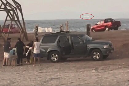 A suspected UFO with flashing lights was spotted hovering over a beach in Antofagasta, Chile, sparking debate online as locals dismiss airport runway theories.